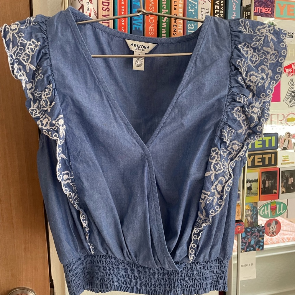 Blue shirt.